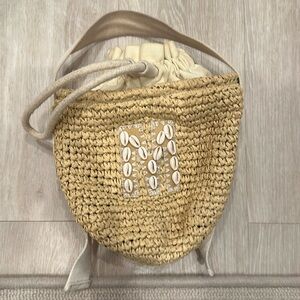 Stoney Clover raffia woven bucket bag